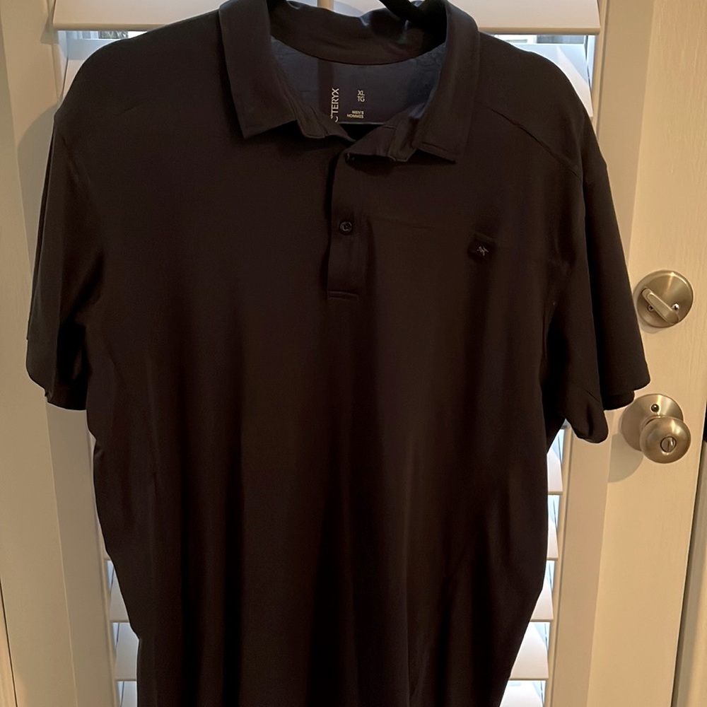 Arcteryx navy polo shirt, size XL like new